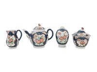 A Royal Worcester Painted and Parcel Gilt Porcelain Tea and Coffee Service