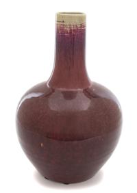 A Chinese Sang de Boeuf Glazed Bottle-form Vase Height 12 x diameter 7 inches. — LATE 18TH/EARLY 19TH CENTURY