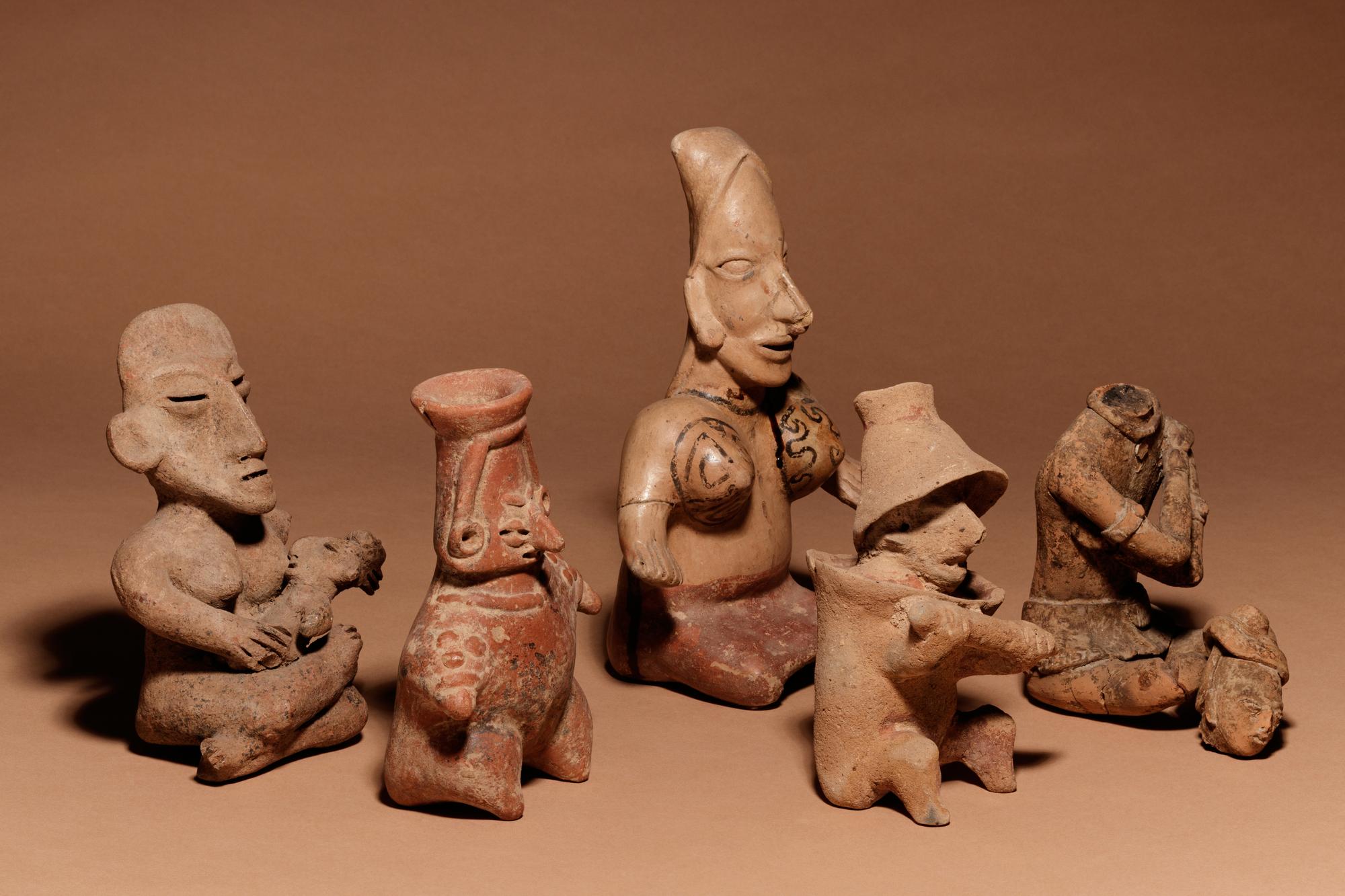 A Group of Five Pre-Columbian Terracotta Seated Figures