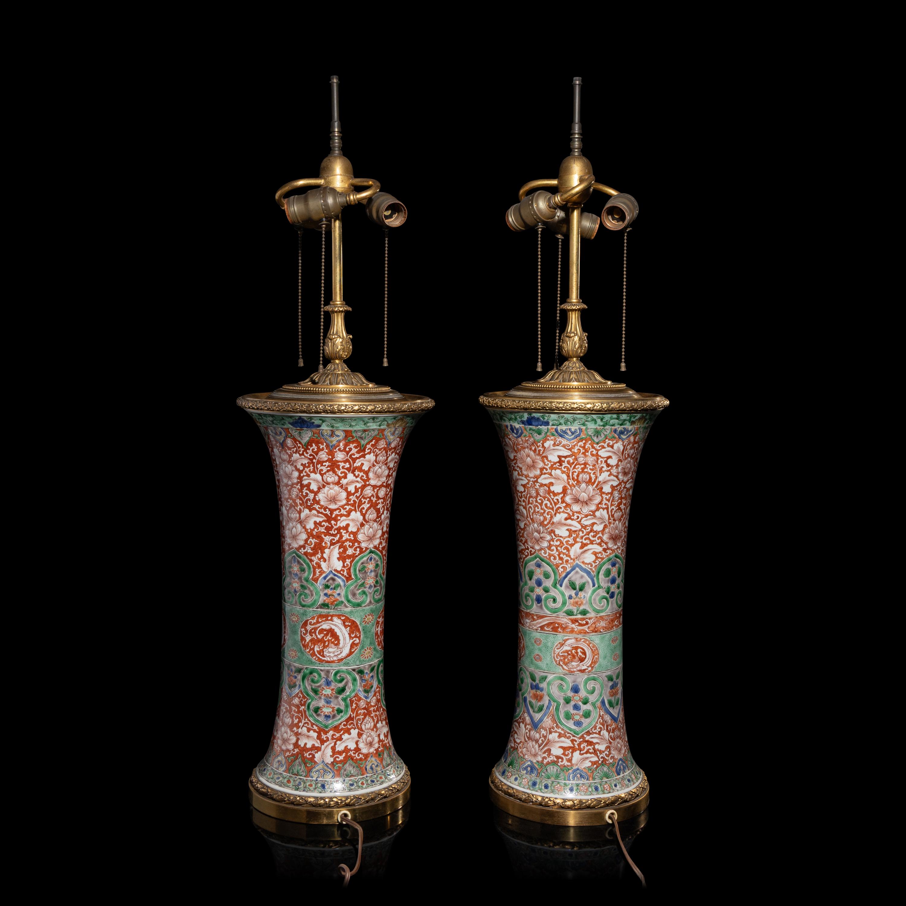 An Associated Pair of Chinese Famille Verte 'Flowers' Porcelain Gu Vases, 18th/19th Century — 清中期 五彩纏枝花卉紋觚一對