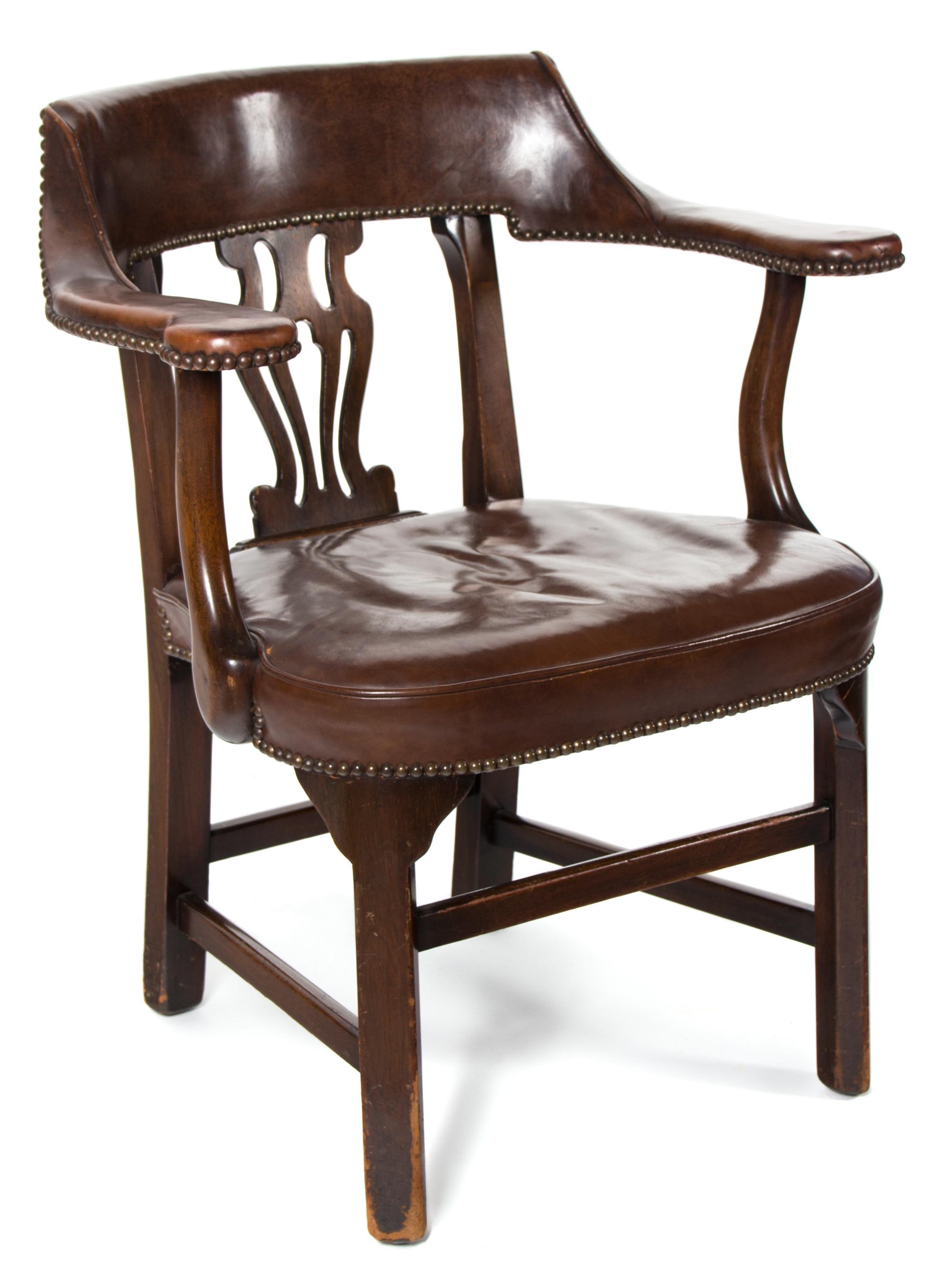 A George II Style Mahogany Library Chair Height 32 x width 26 1/2 x depth 22 inches. — 20TH CENTURY