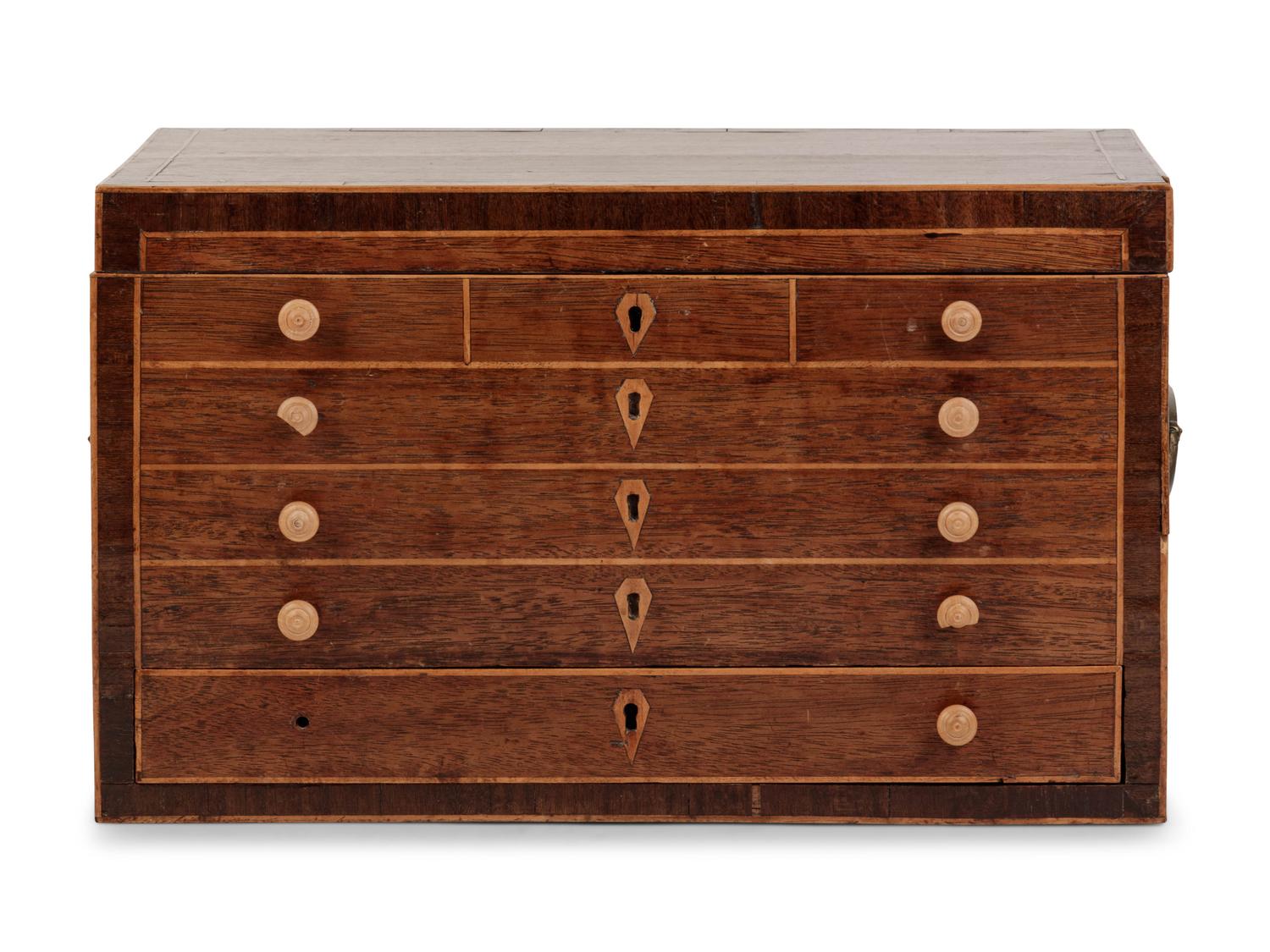 A Regency Brass Mounted and Inlaid Mahogany Spool Cabinet