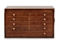 A Regency Brass Mounted and Inlaid Mahogany Spool Cabinet