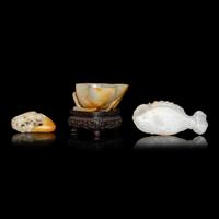 Two Chinese Jade Ornaments and A Jadeite 'Lotus Leaf' Brush Washer, Qing Dynasty 清 黃翡荷葉洗及白玉灑金把件兩枚