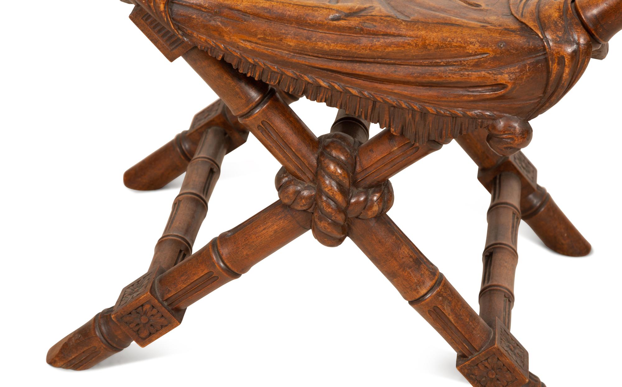 A Continental Carved Walnut X-form Stool