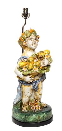 An Italian Majolica Figure Height overall 29 1/4 inches.