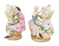 A Pair of Meissen Porcelain Figural Pitchers