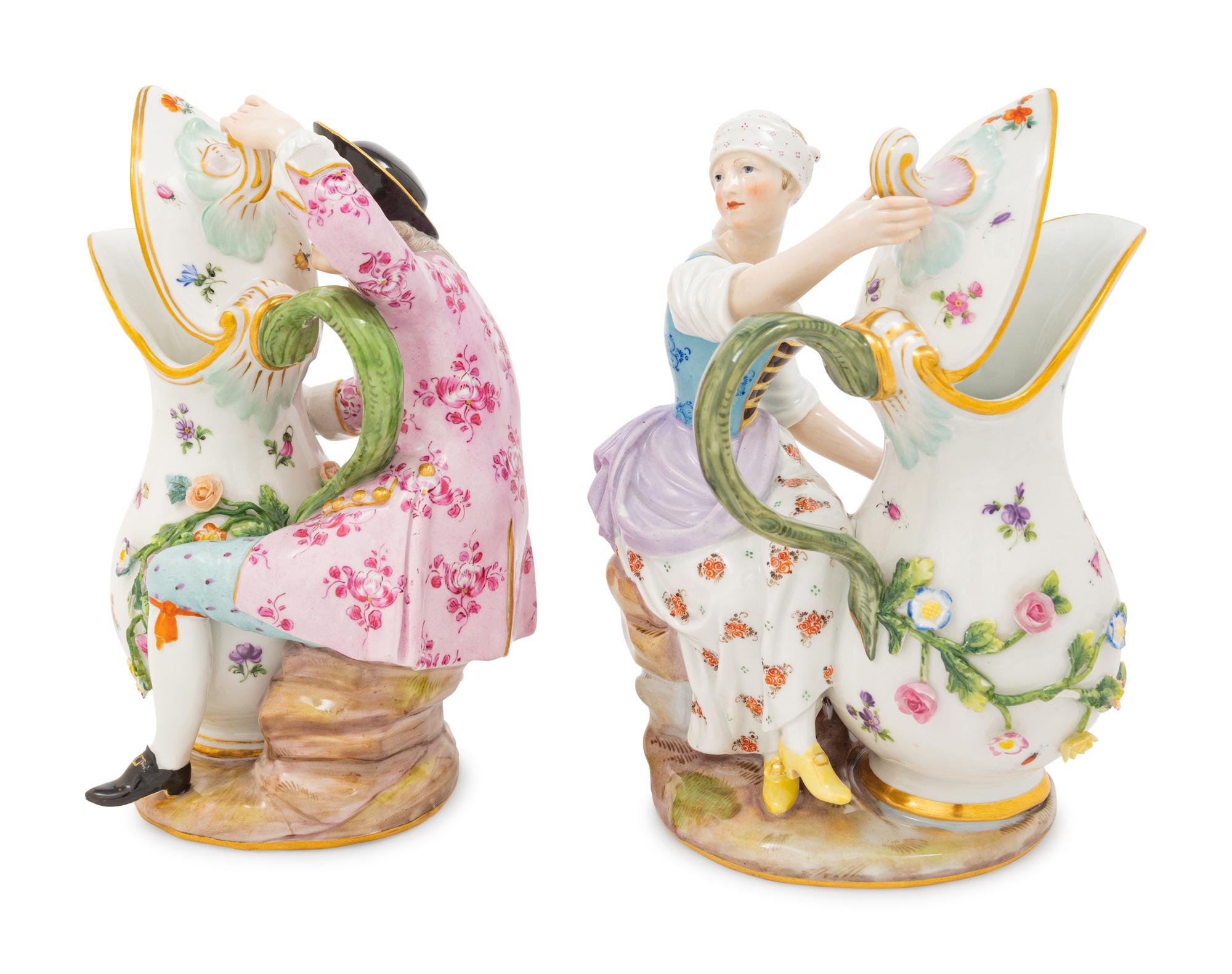 A Pair of Meissen Porcelain Figural Pitchers
