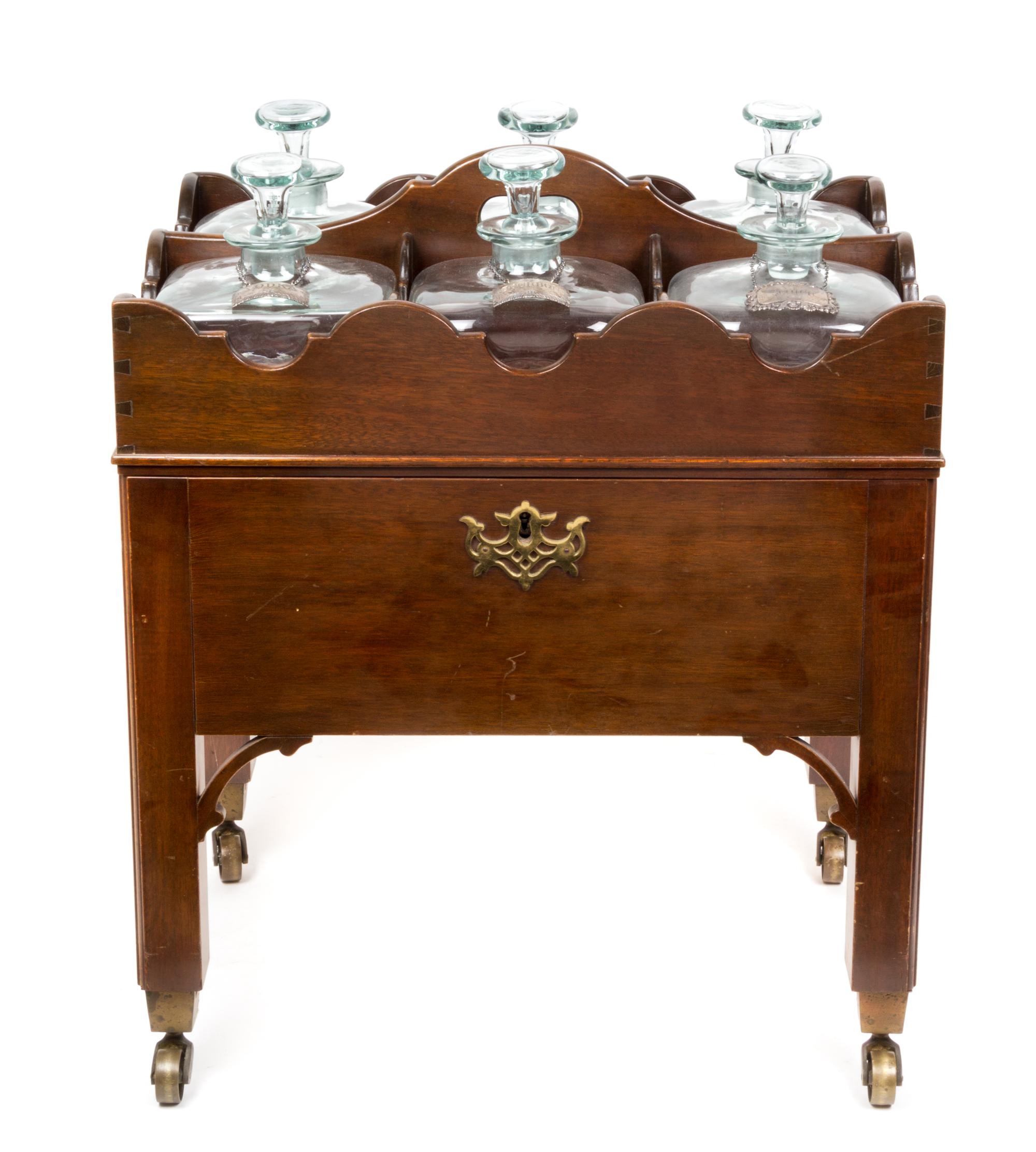 An English Mahogany Cellarette Height 23 x width 20 1/4 x depth 14 1/2 inches. — 19TH CENTURY
