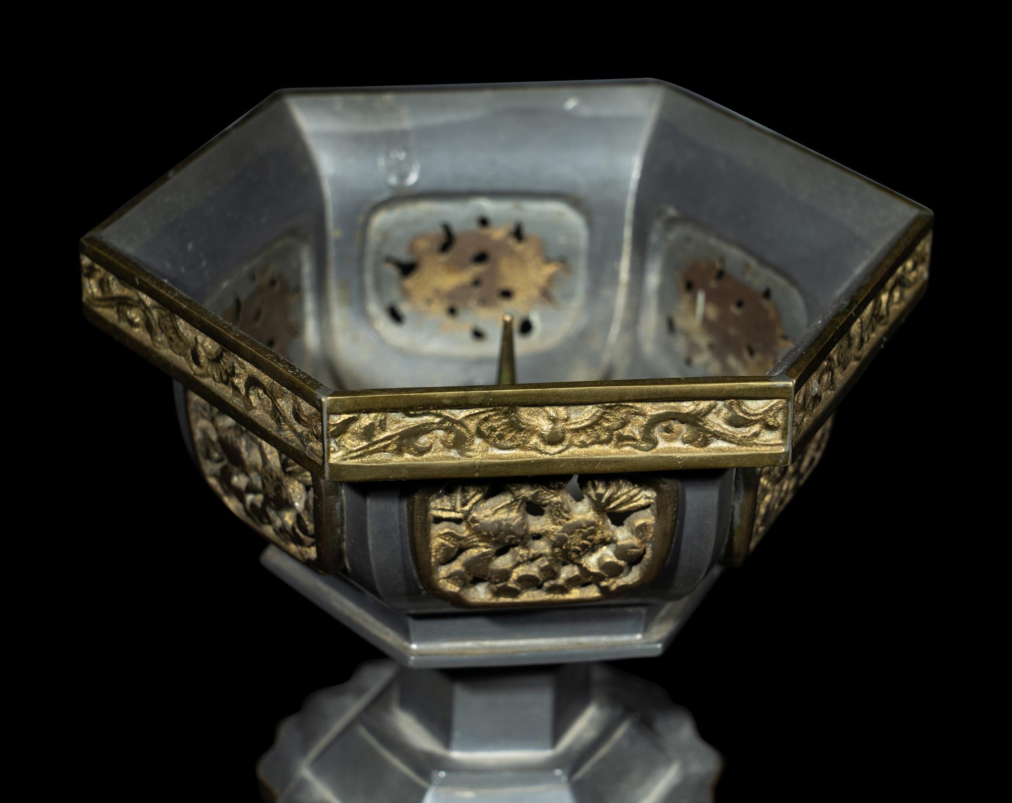 A Pair of Chinese Pewter Candle Holders