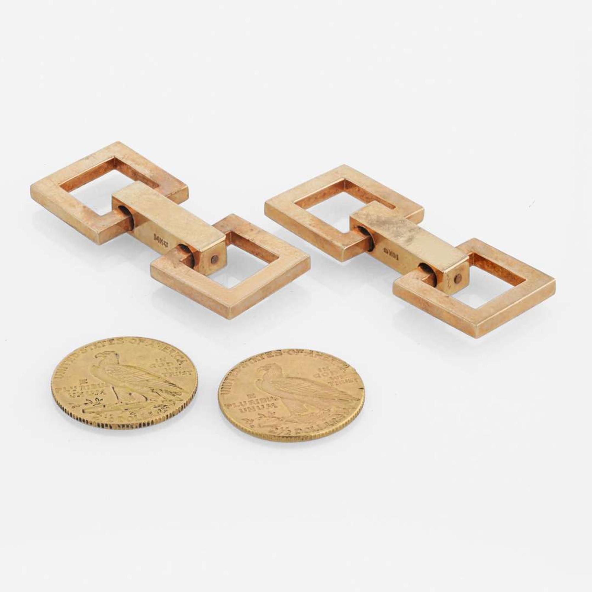A pair of 14K yellow gold cufflinks and gold coins