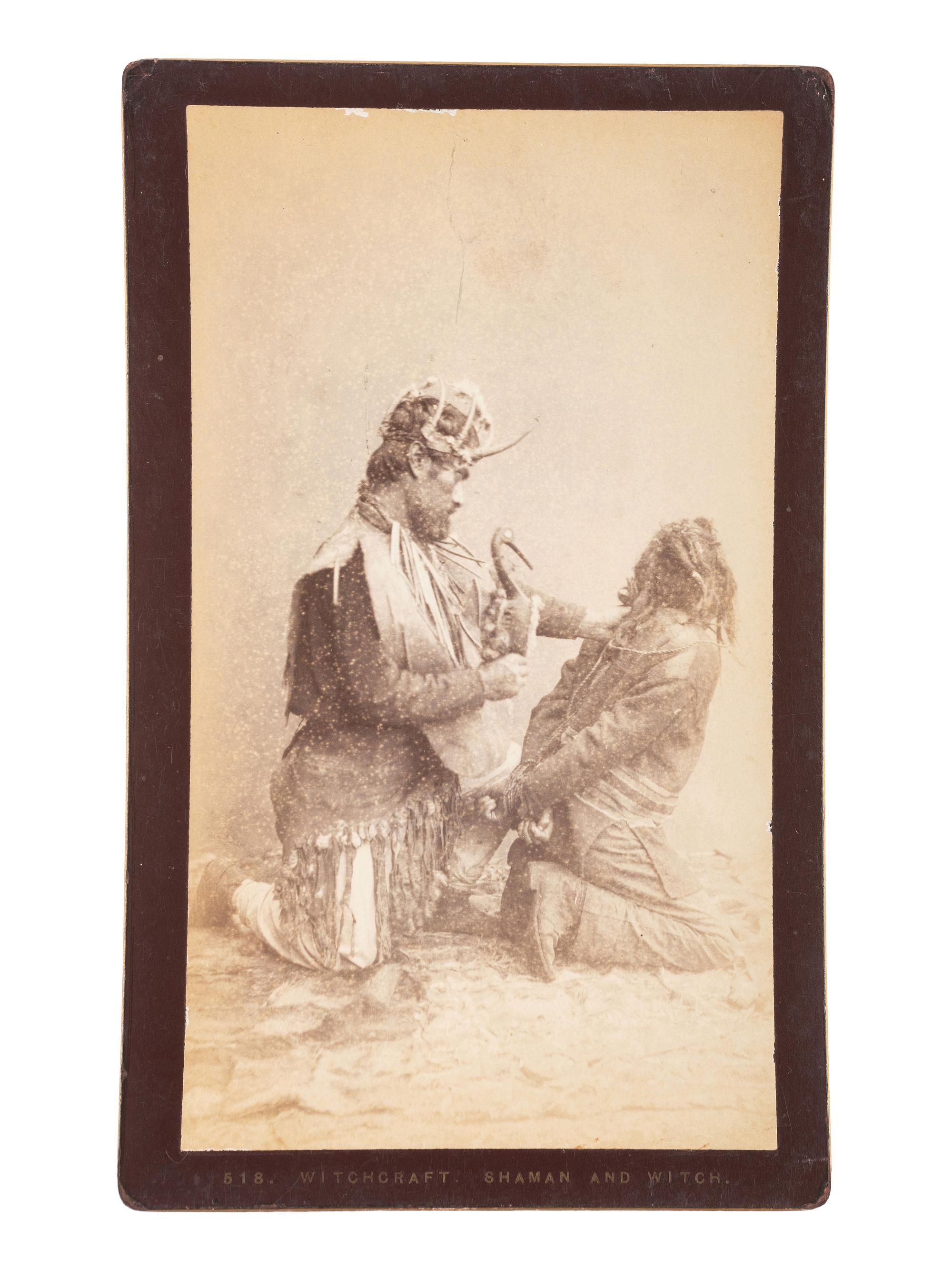 [NATIVE AMERICANS]. DE GROFF, Edward, photographer. Boudoir card featuring a Haida shaman and witch. Sitka, AK: [ca 1890].
