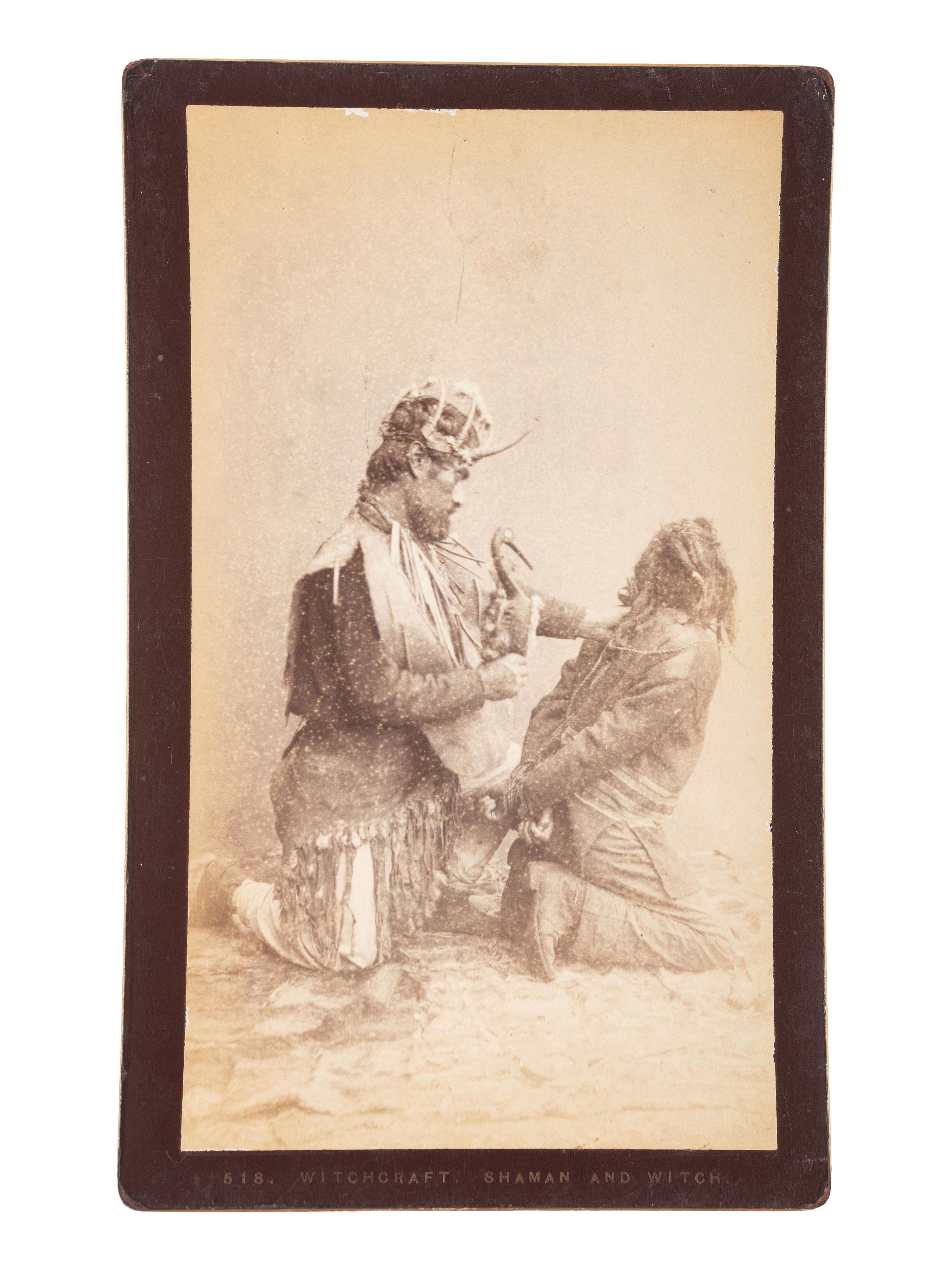[NATIVE AMERICANS]. DE GROFF, Edward, photographer. Boudoir card featuring a Haida shaman and witch. Sitka, AK: [ca 1890].