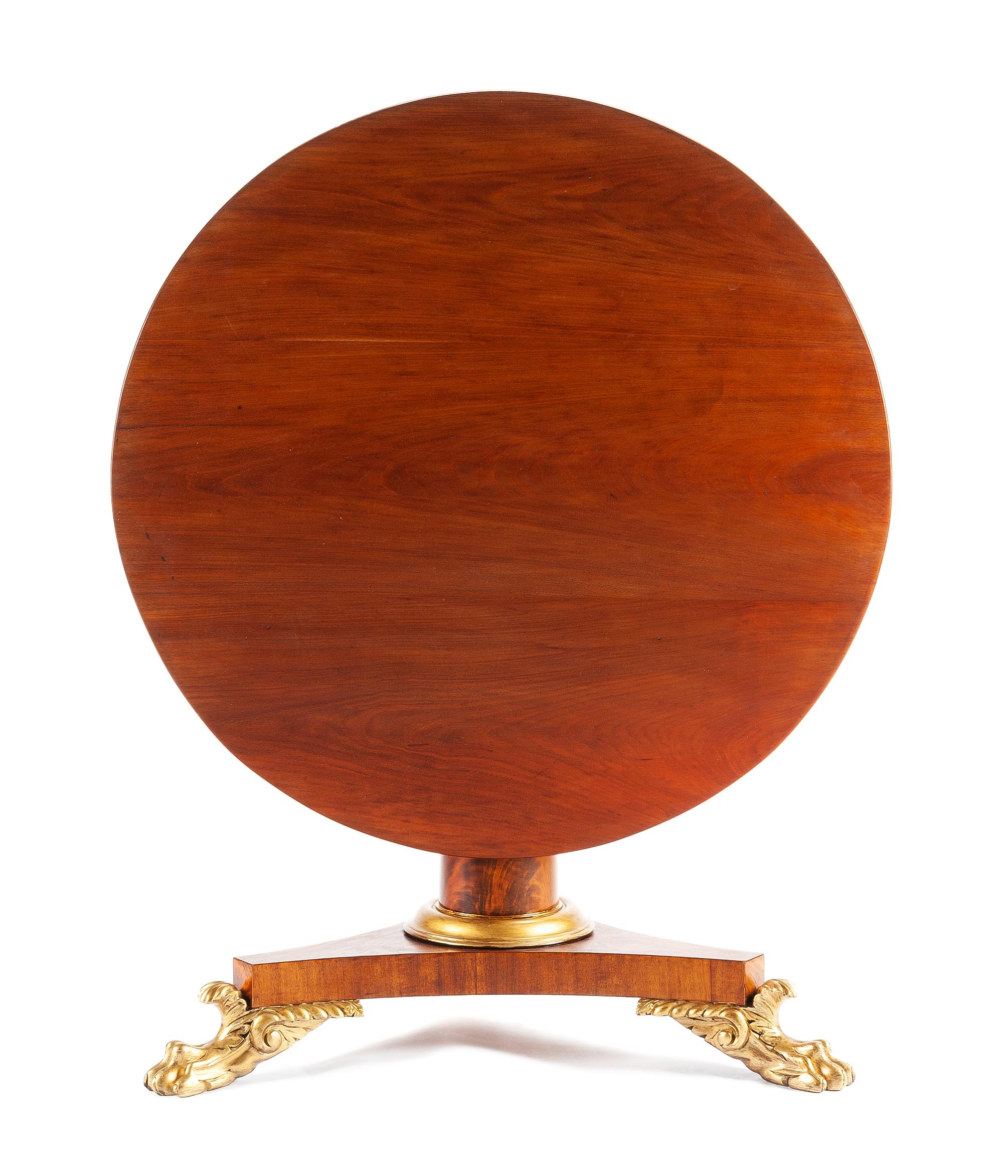 A William IV Parcel Gilt Mahogany Center Table Height 28 x diameter of top 41 inches. — 19TH CENTURY