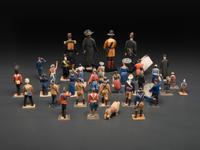 A Collection of Folk Art Carved and Painted 'English Parade' Figures