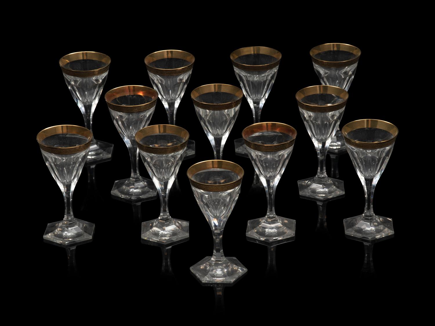 A Moser Gilt Decorated Glass Stemware Service
