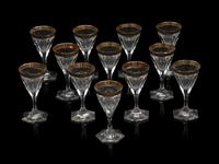 A Moser Gilt Decorated Glass Stemware Service