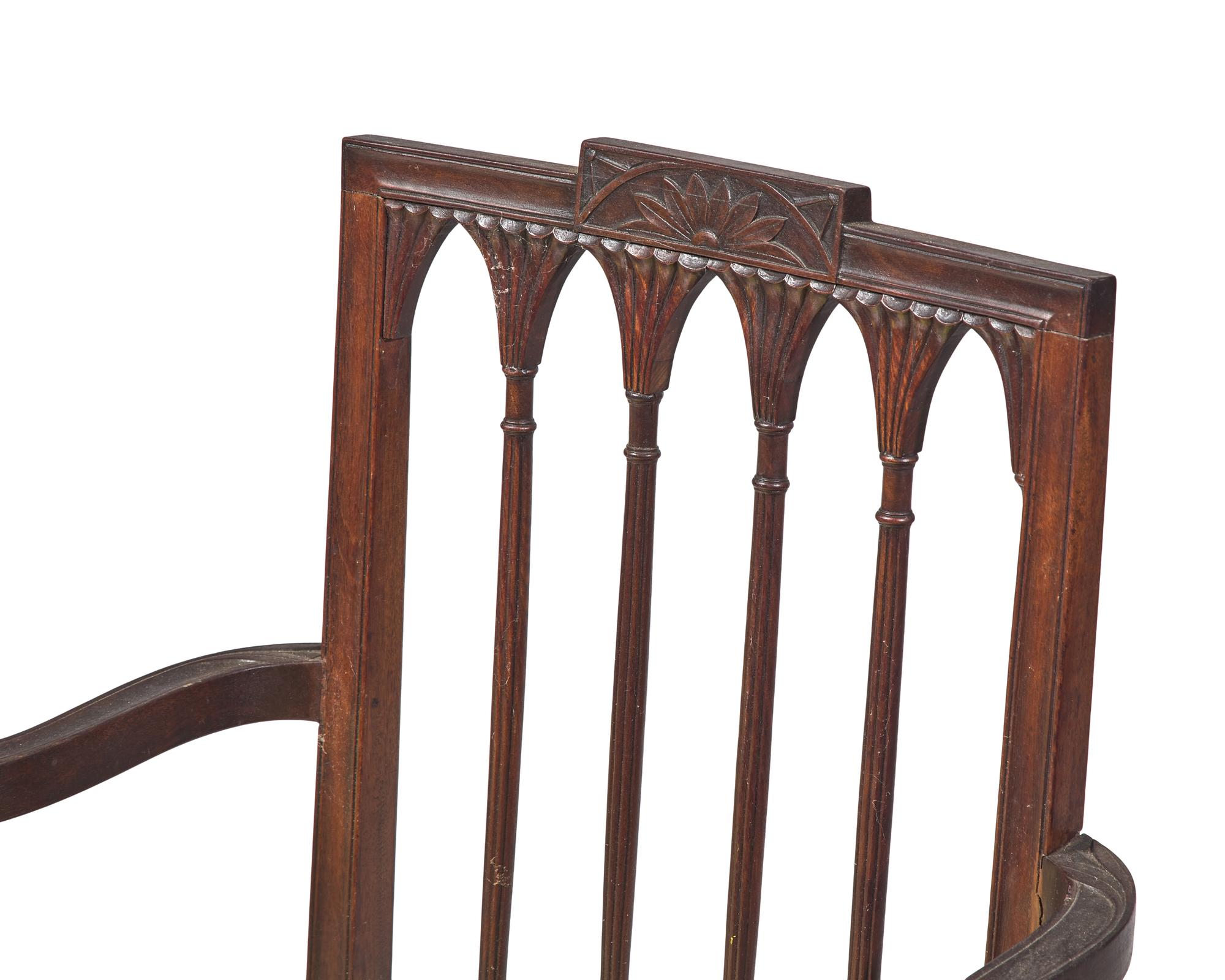 An Assembled Pair of Federal Carved Mahogany Armchairs