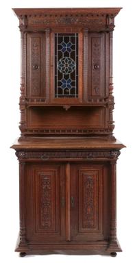 A Renaissance Revival Style Oak Server, Height 76 3/4 x width 39 1/2 x depth 22 1/4 inches.