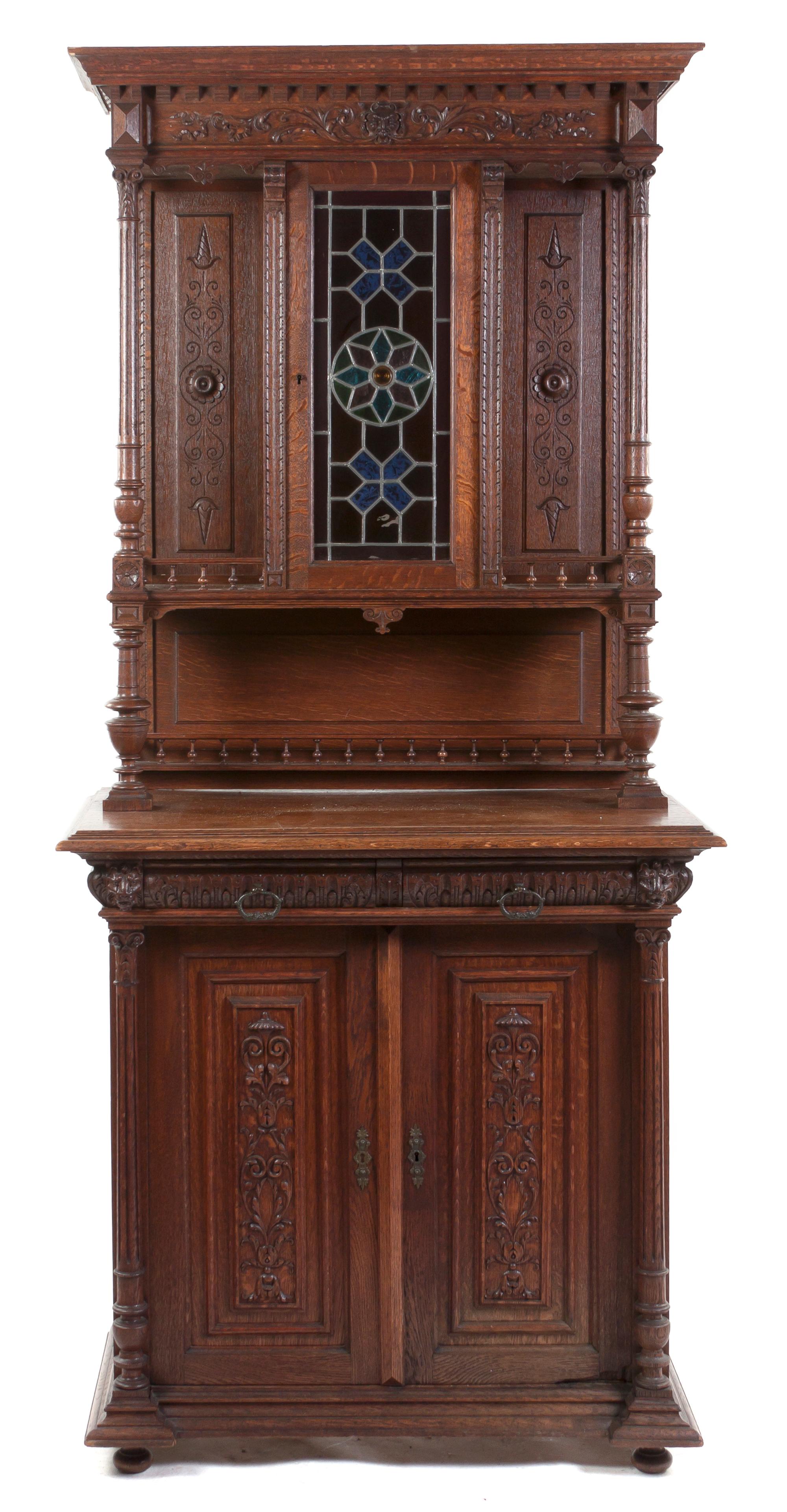 A Renaissance Revival Style Oak Server, Height 76 3/4 x width 39 1/2 x depth 22 1/4 inches.