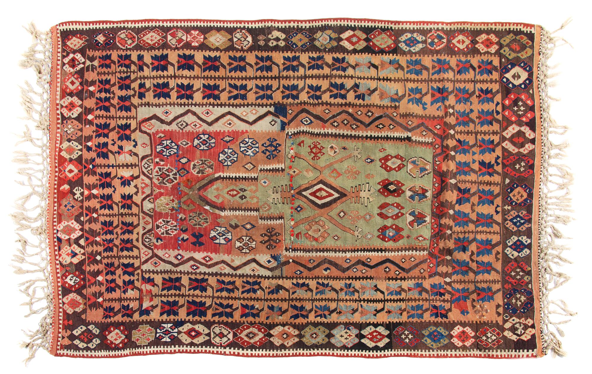 A Turkish Wool and Metallic Thread Prayer Rug 5 feet 8 inches x 4 feet 4 inches. — CIRCA 1870
