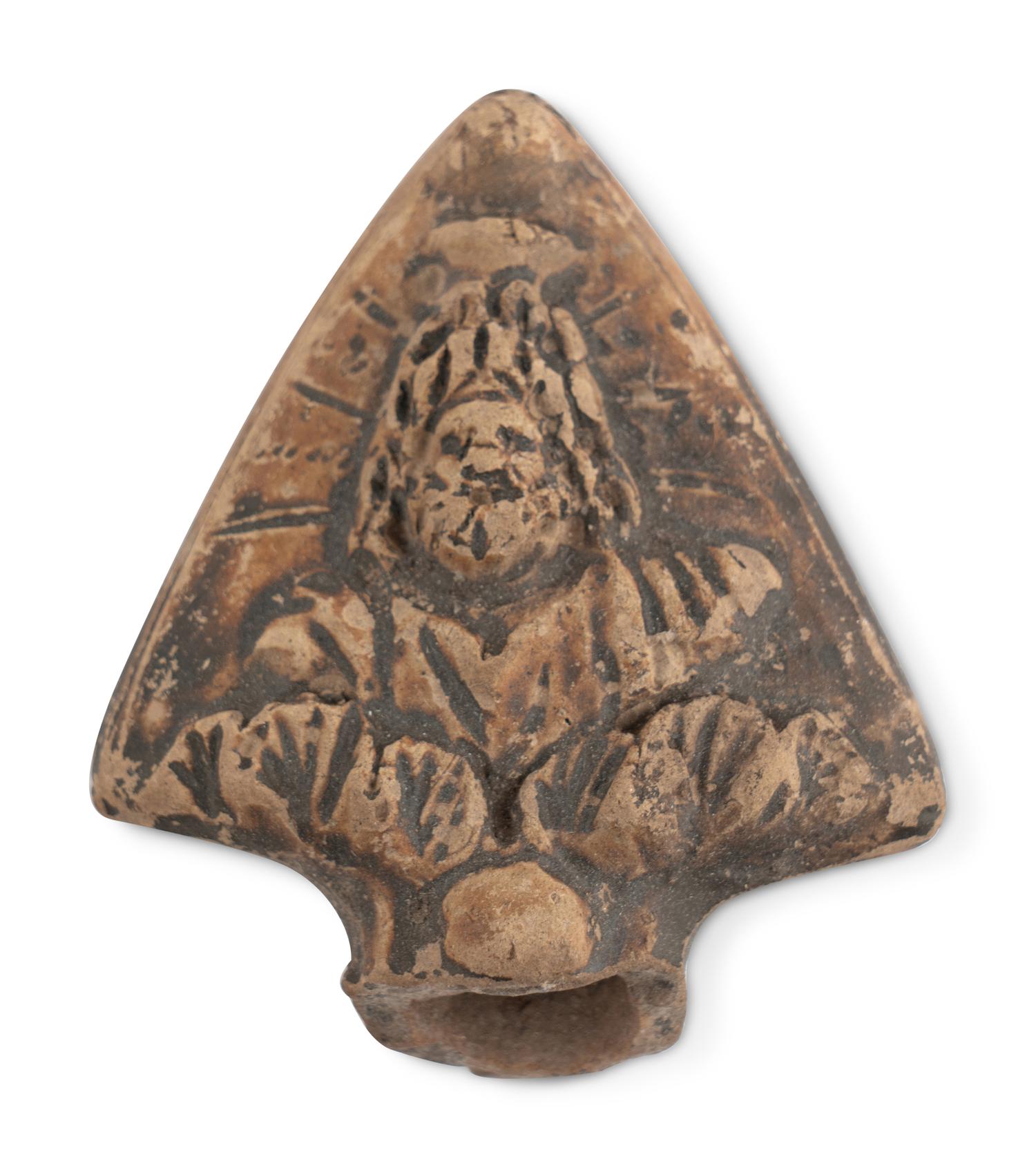 A Group of Seventeen Roman Oil Lamps and Lamp Handles