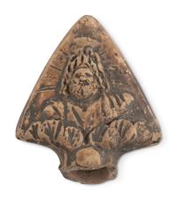 A Group of Seventeen Roman Oil Lamps and Lamp Handles