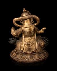 A Large and Rare Sino-Tibetan Gilt Lacquer Wood Figure of Vaishravana