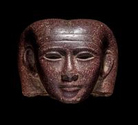 A Roman Porphyry Head of an Egyptian Woman