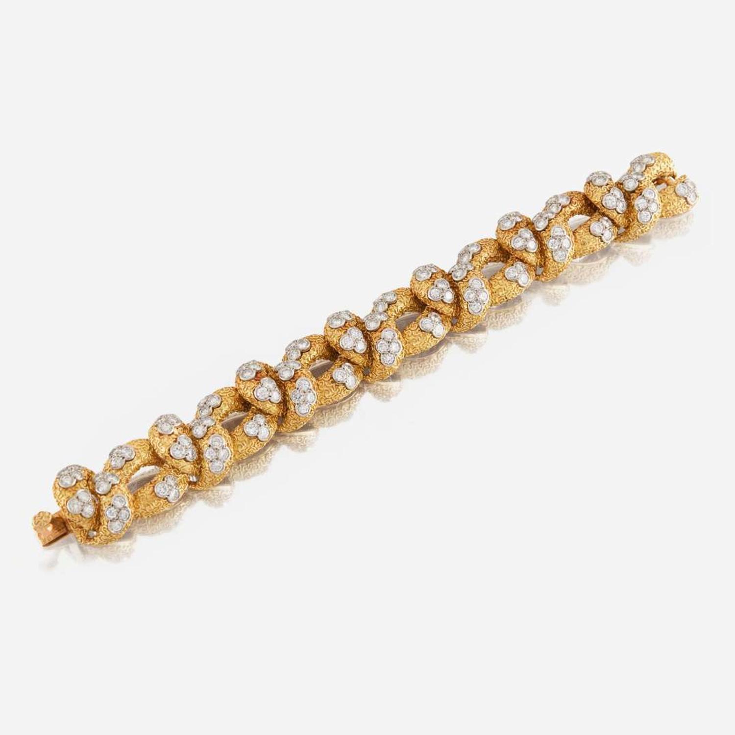 A gold, diamond, and platinum bracelet