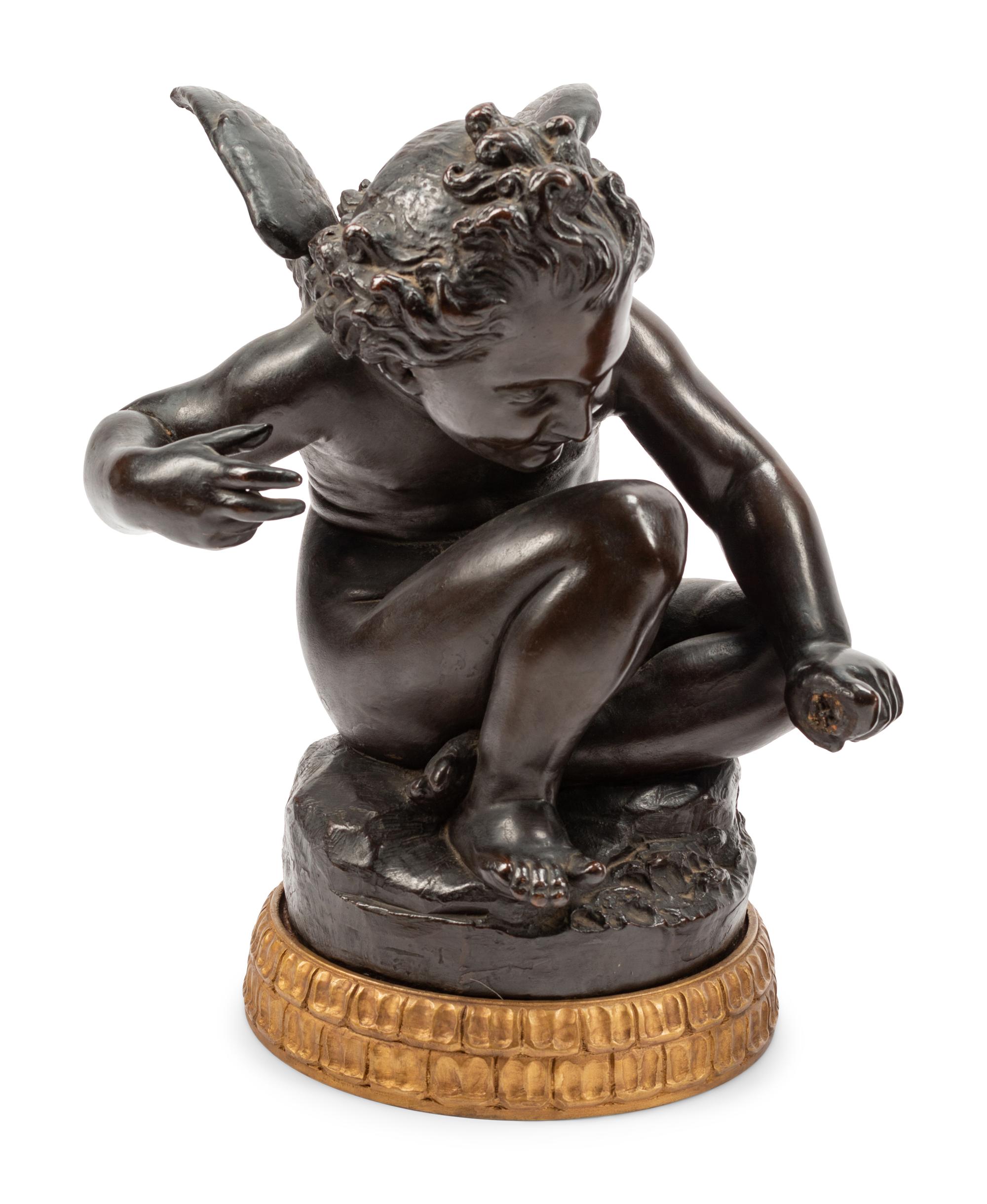 A Pair of Bronzed Terra Cotta Figures on Giltwood Bases