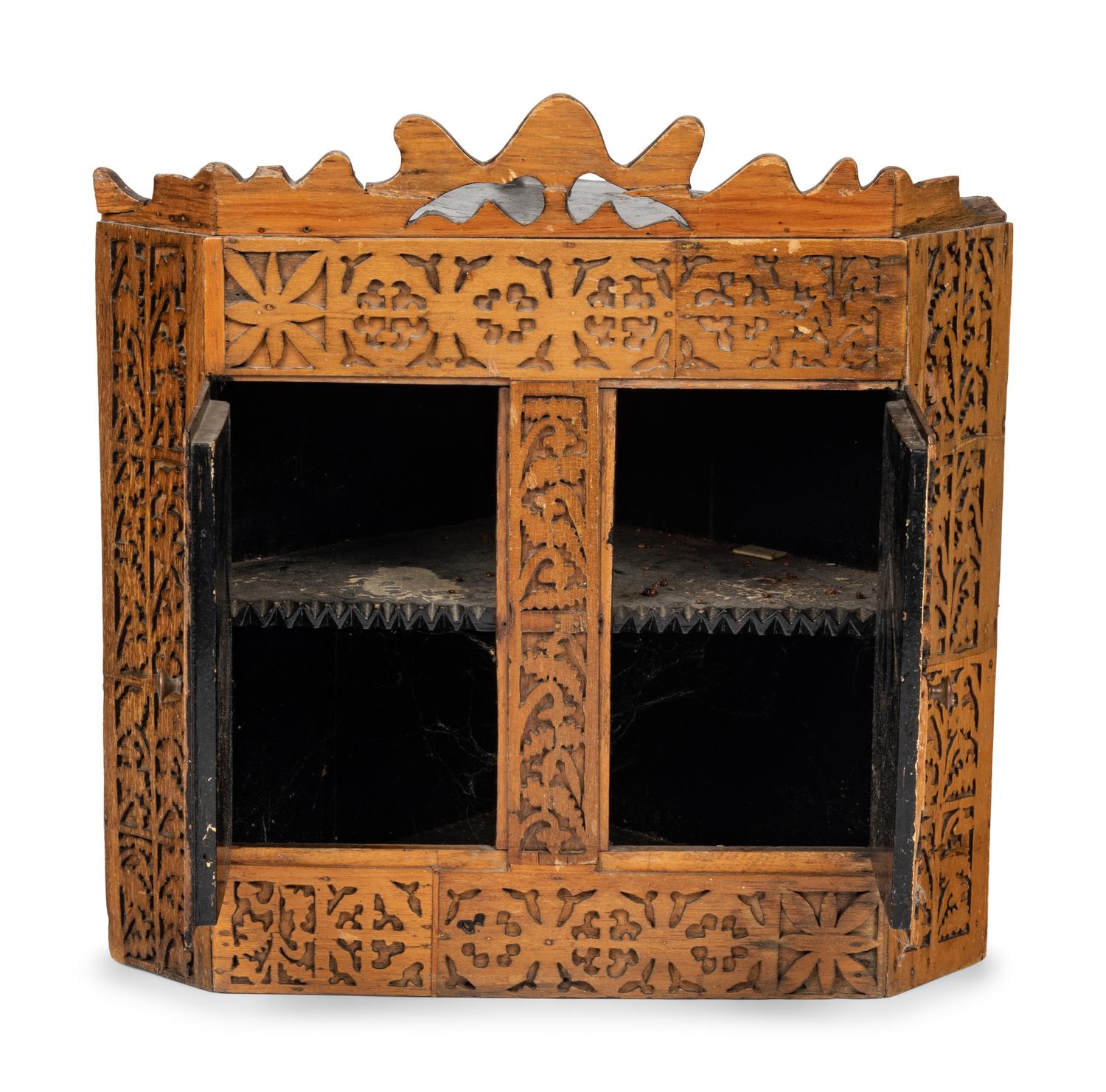 A Chip Carved Hanging Corner Cupboard