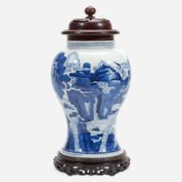 A Chinese blue and white porcelain vase with carved wood cover and stand The vase Kangxi period