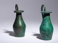 A Pair of Etruscan Bronze Olpai
