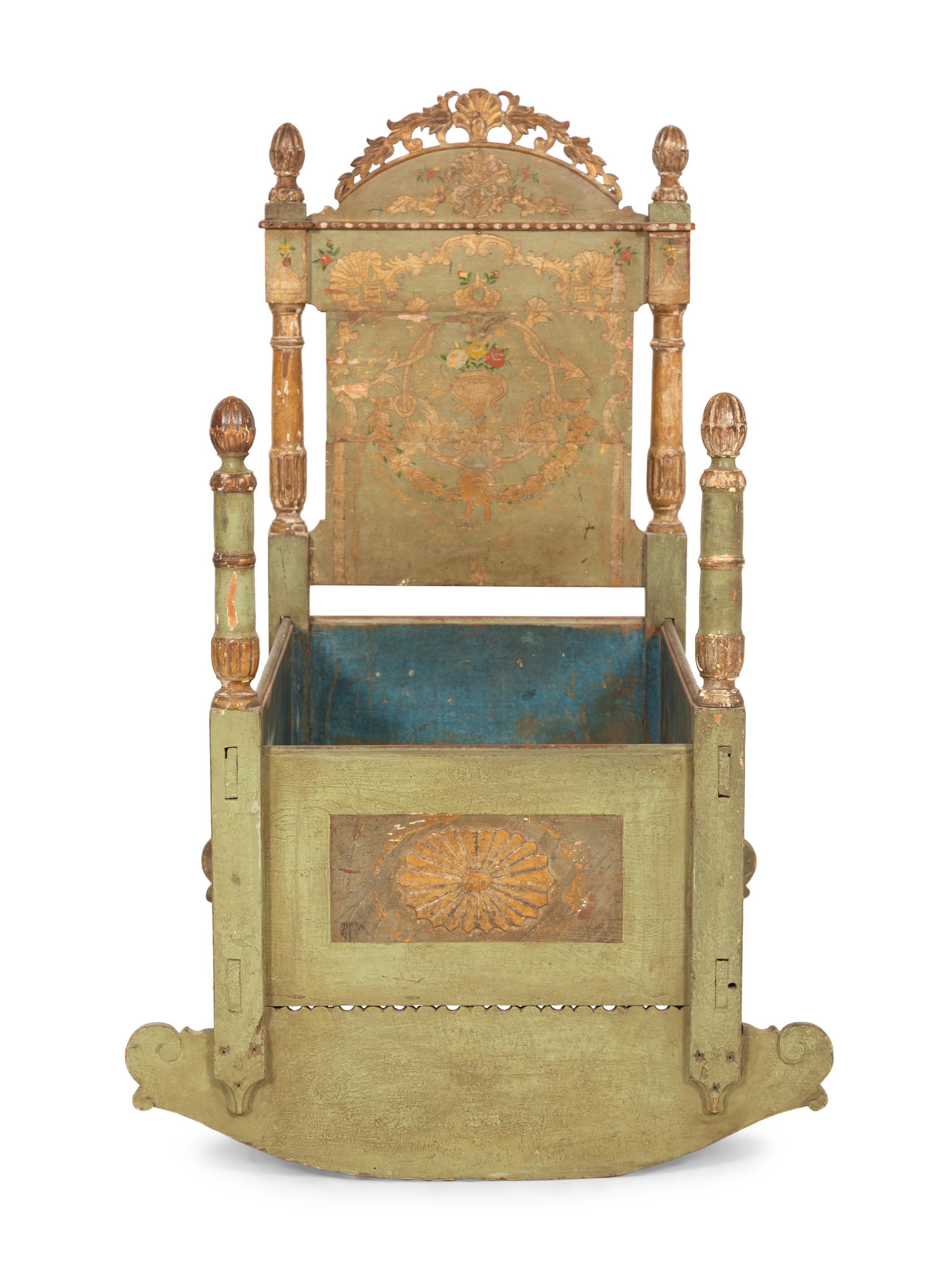 A Venetian Painted and Parcel Gilt Rocking Cradle