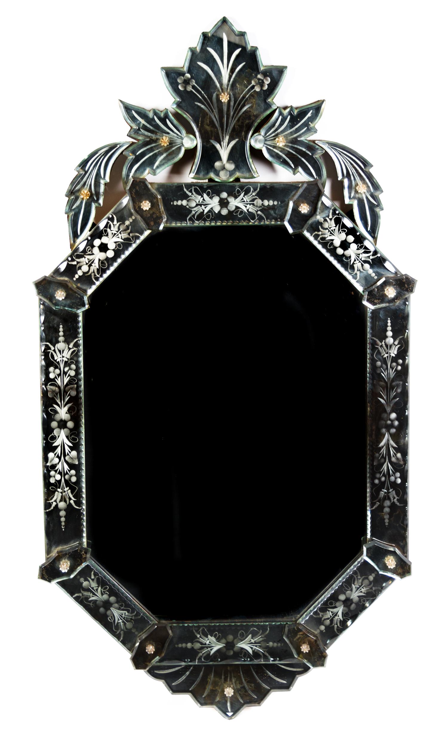 A Venetian Glass Mirror Height 36 x width 18 1/2 inches.