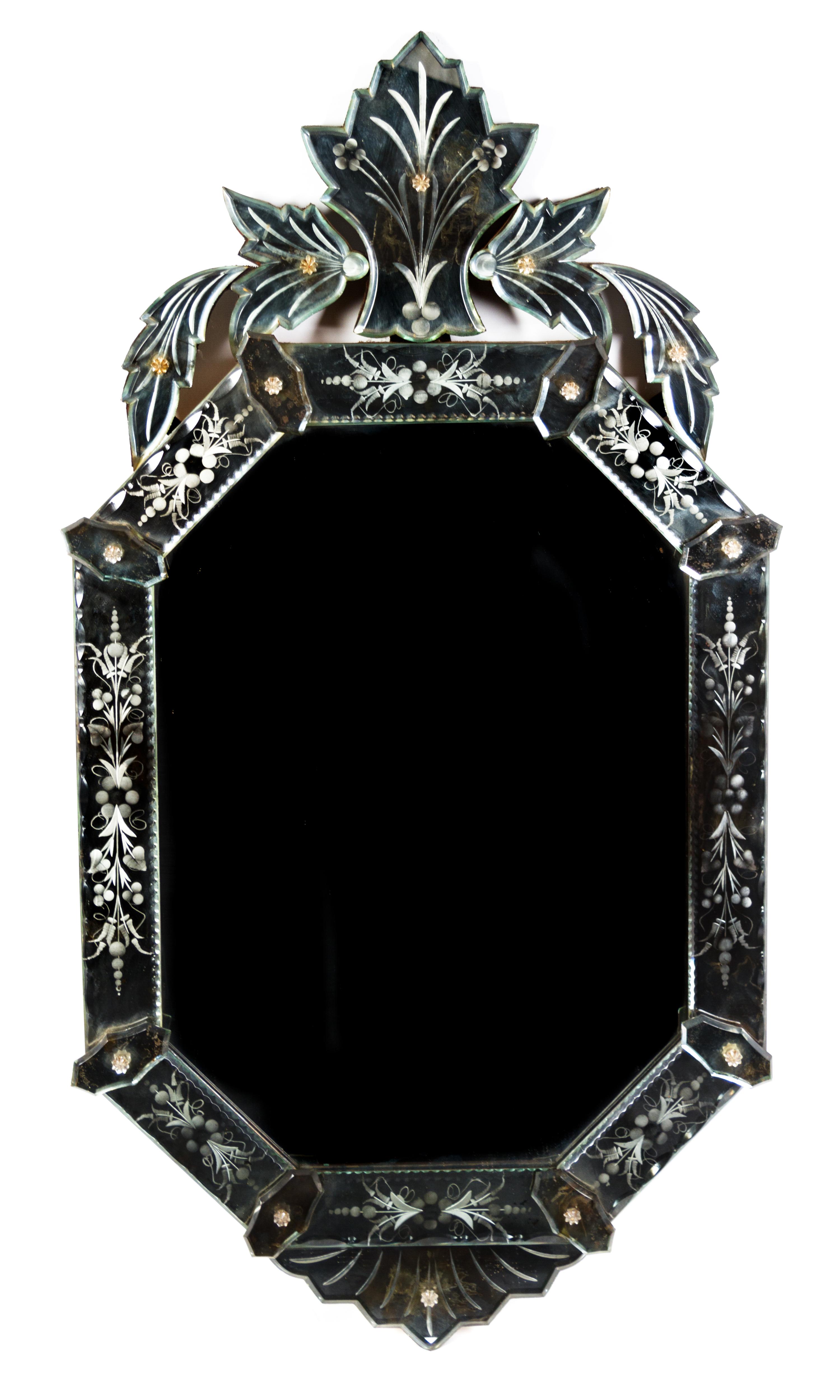 A Venetian Glass Mirror Height 36 x width 18 1/2 inches.
