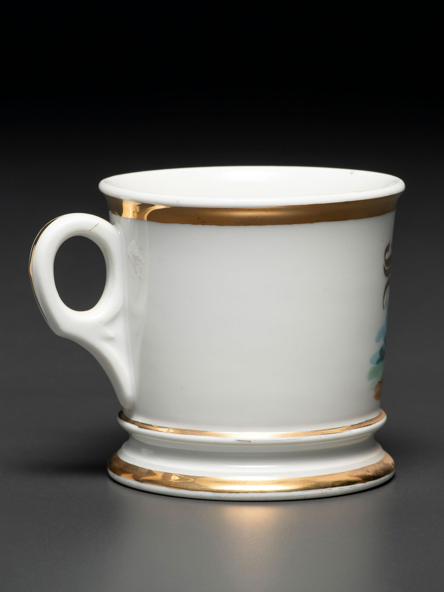 A Porcelain Shaving Mug Depicting a High Wheelman