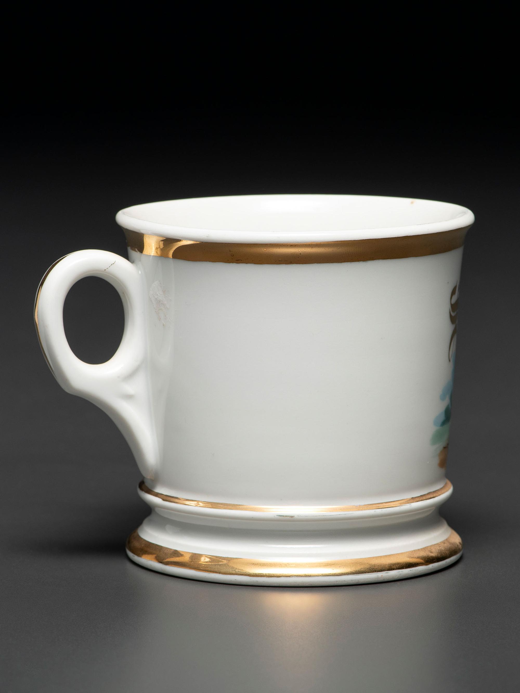 A Porcelain Shaving Mug Depicting a High Wheelman
