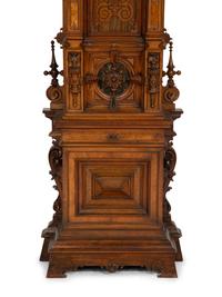 A German Carved Walnut and Marquetry Tall Case Clock