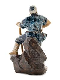 A Chinese Ceramic Figure of a Man