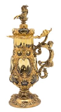 A Continental Gilt Bronze Mounted Molded Glass Ewer Height 15 1/2 inches. — 20TH CENTURY