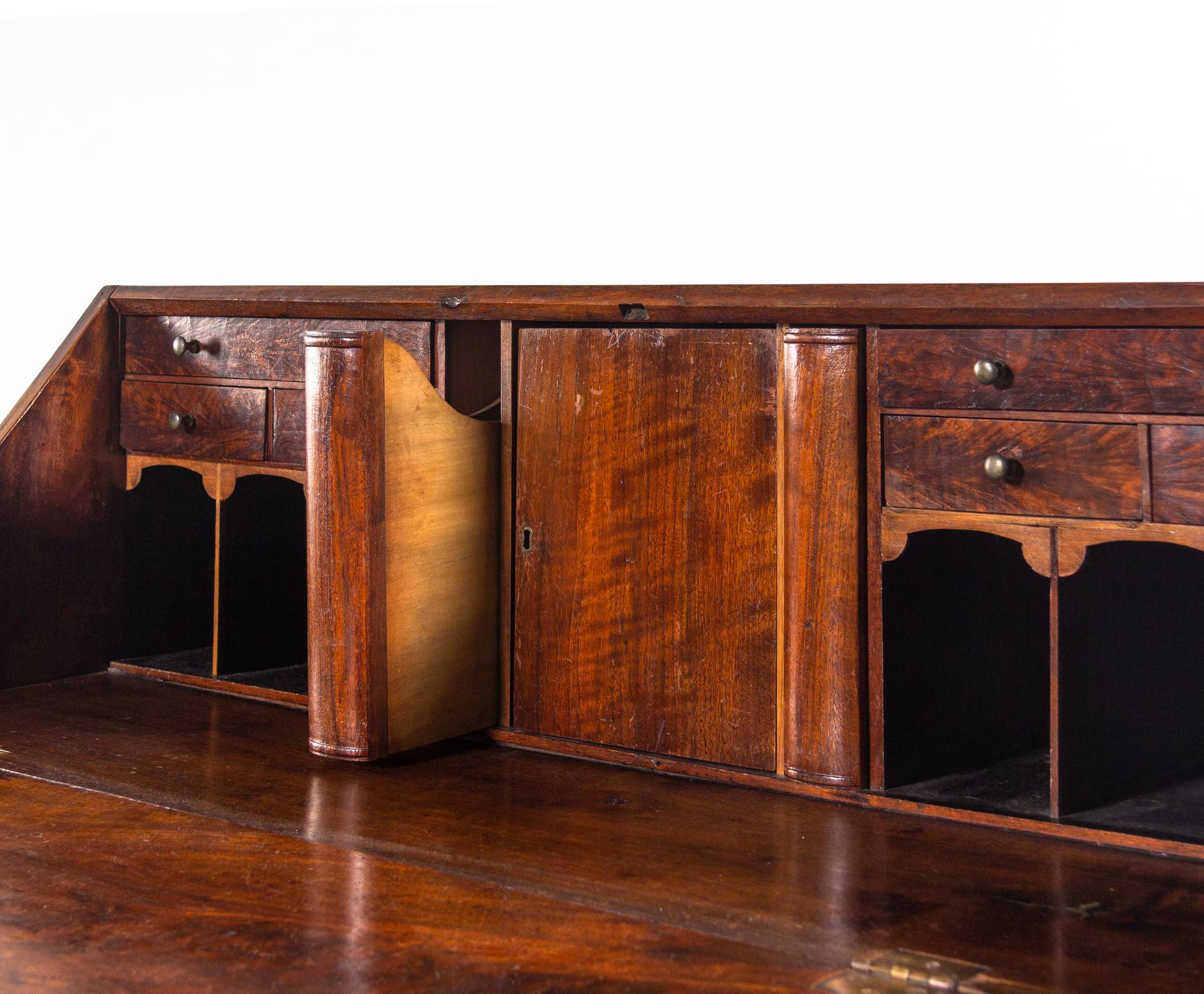 A Chippendale Walnut Slant-Front Bureau
