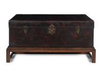 A Leather-Veneered Trunk on a Later Stand
