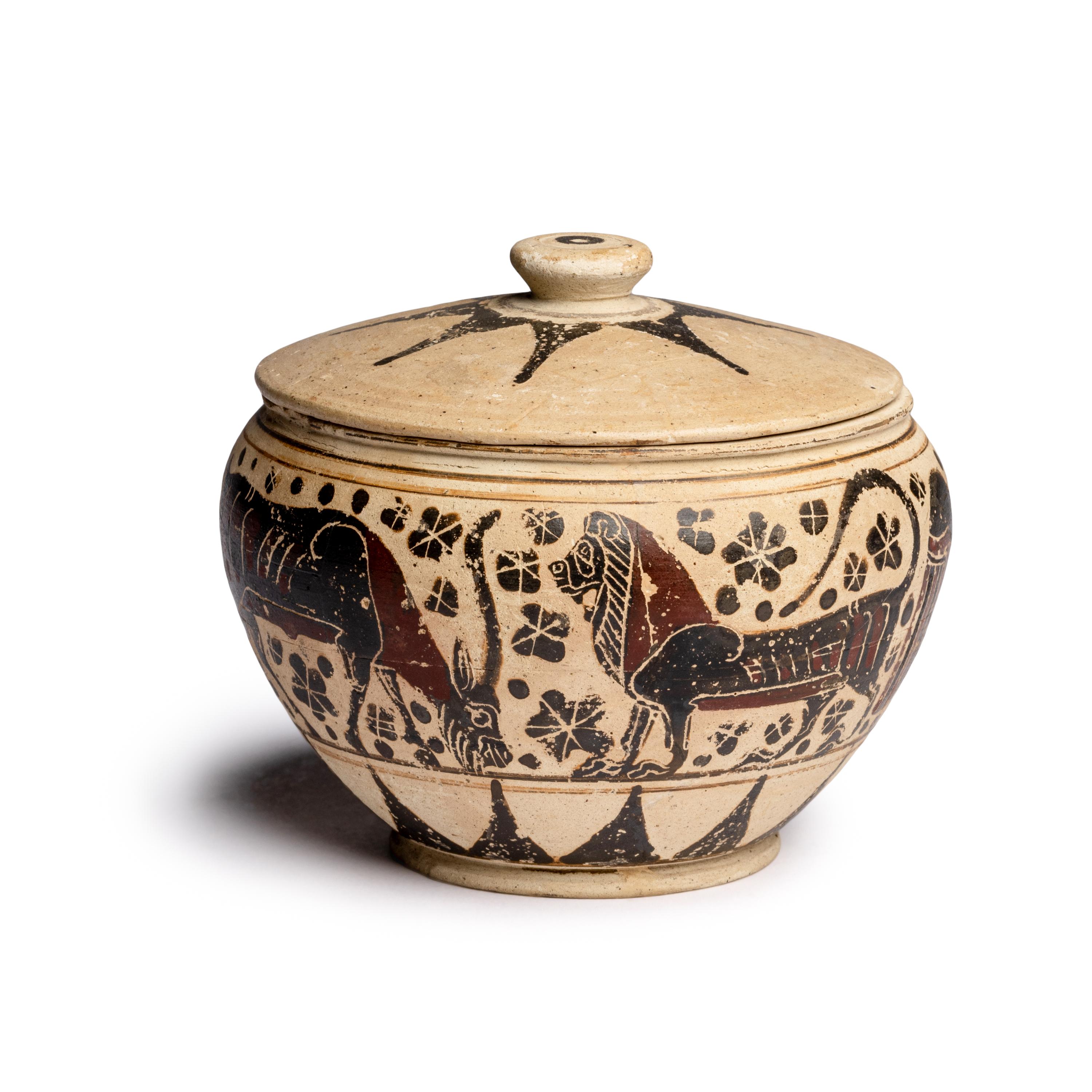 A Corinthian Pottery Lidded Pyxis with Animal Procession
