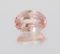 A 6.56 Carat Oval Mixed Cut Padparadscha Sapphire,