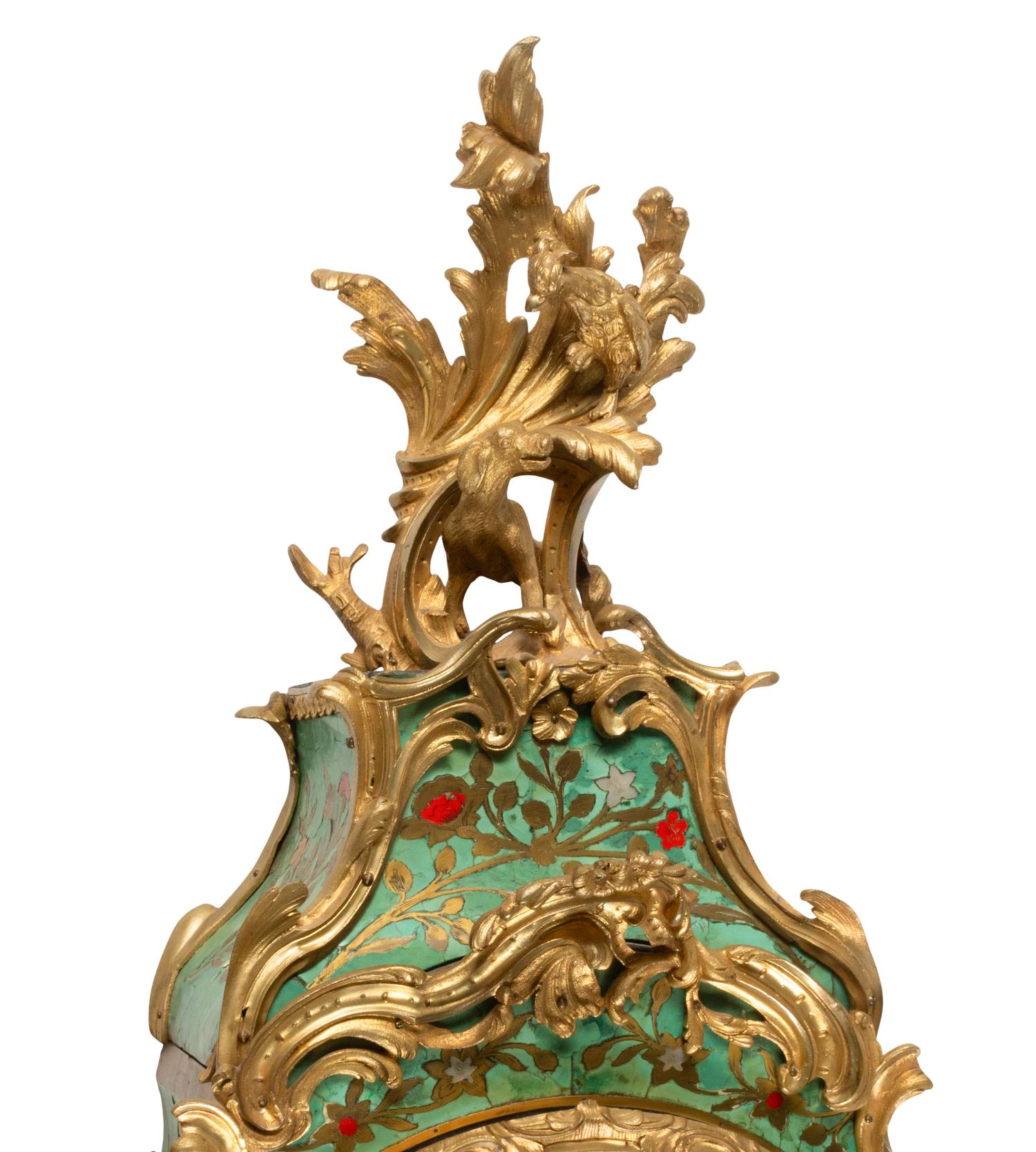 A Louis XV Green-Stained Horn and Gilt Bronze Mounted Cartel Clock and Bracket