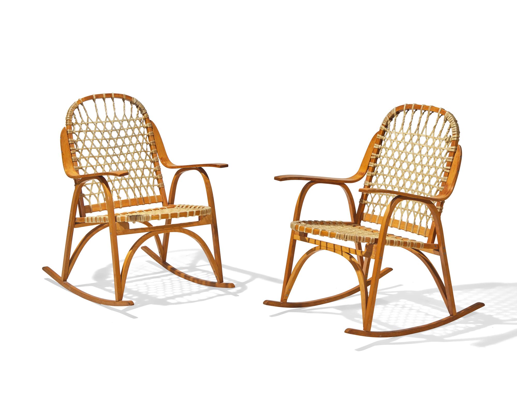 A Pair of Lacquered Fruitwood and Rawhide 'Snowshoe' Rocking Chairs