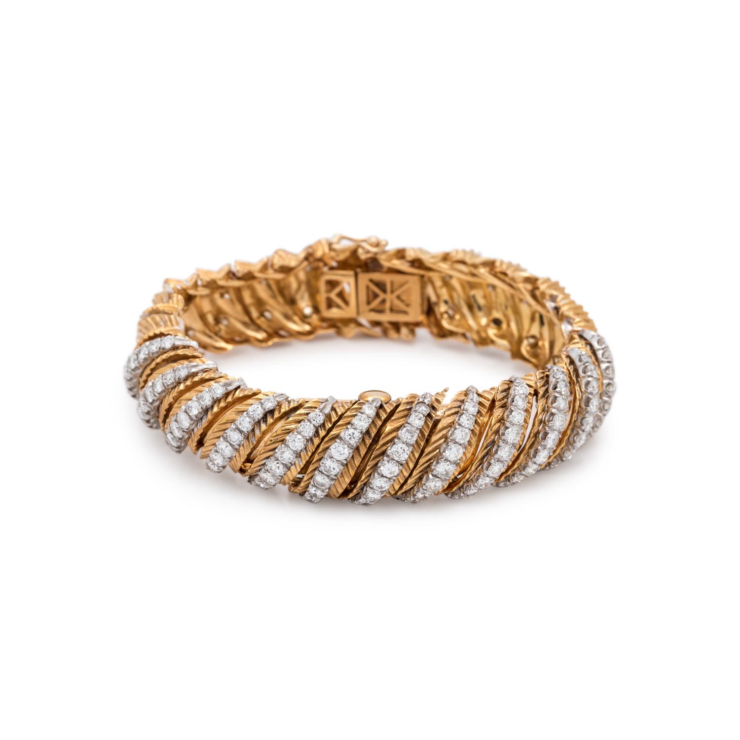 18K YELLOW GOLD AND DIAMOND SURPRISE WATCH