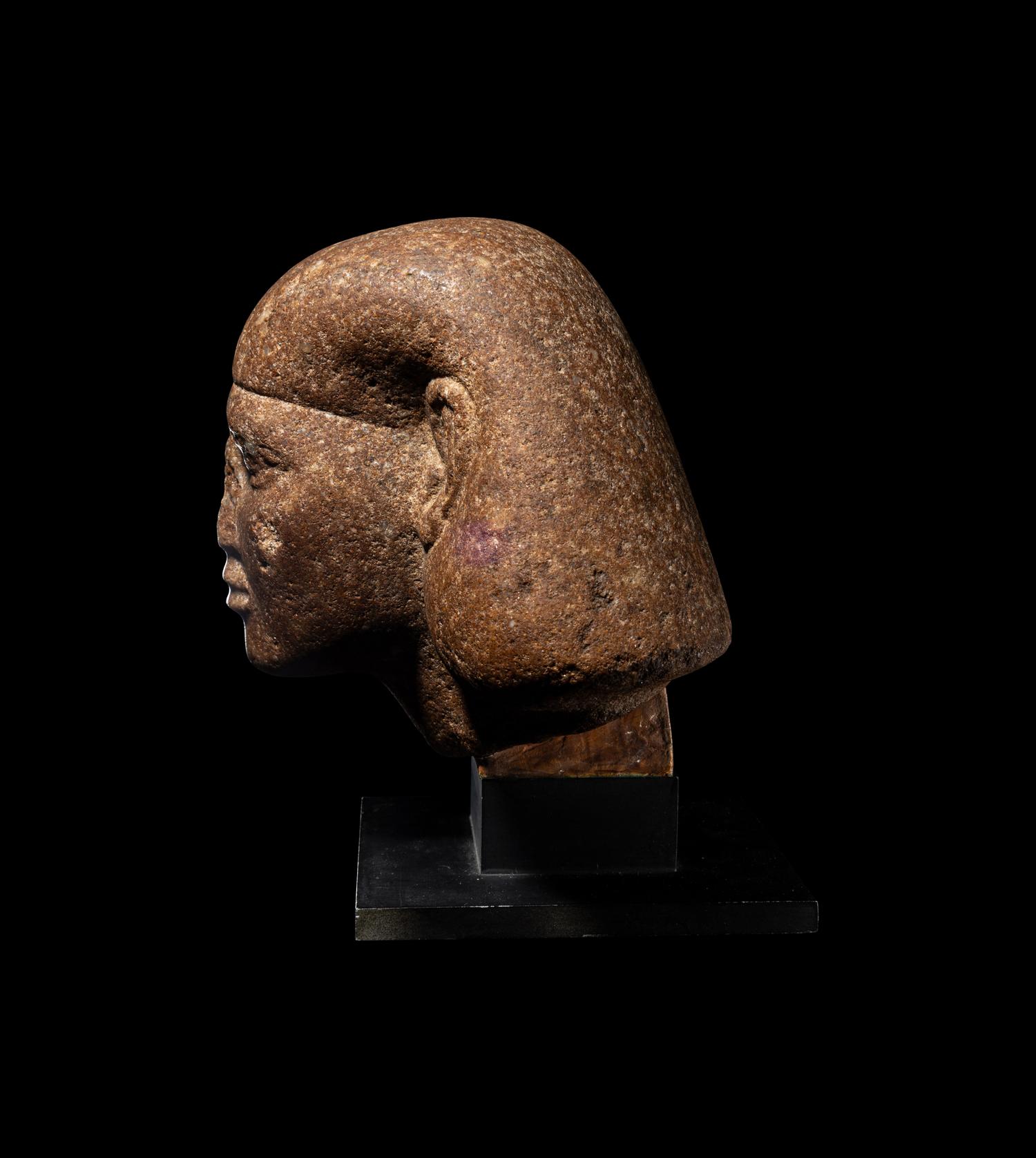 An Egyptian Granite Head of a Scribe